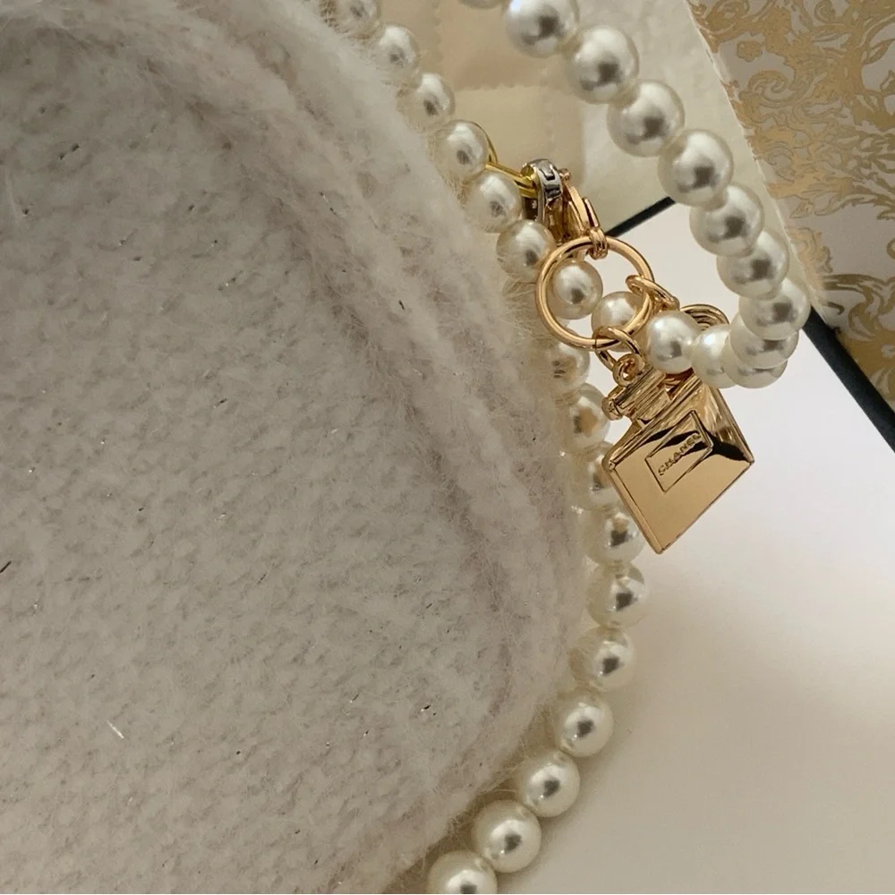 Chanel Pearl-Embellished Cream Bag